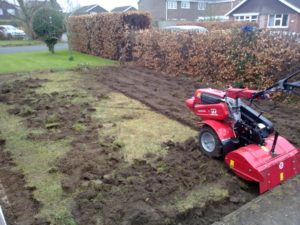 Scawby April 2012, rotovating up an old moss infested lawn preparing it for new turf