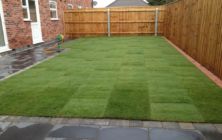 Turfing a new lawn on a development site at Humberston